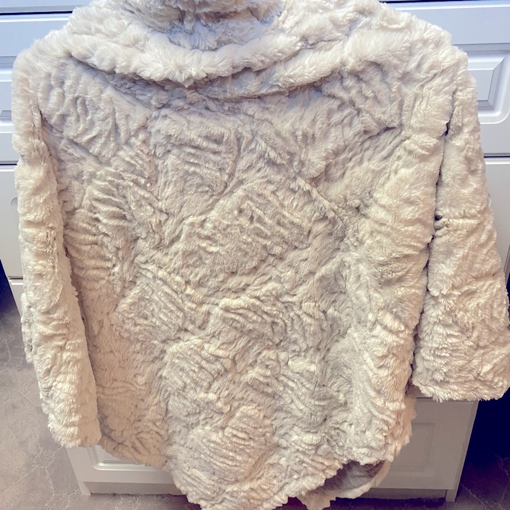 Johnston and Murphy Luxe cream poncho.